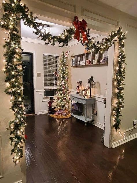 Wide Hallway Doorway Enhanced with Garland and Lights — Christmas Door Frame Lights