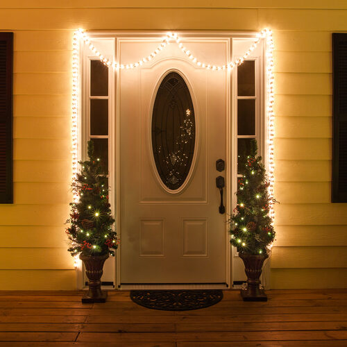 Symmetrical Door Frame Lights with Potted Trees — Christmas Door Frame Lights