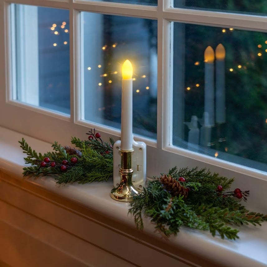 Elegant LED Taper with Garland and Reflective Window — Christmas Window Candles