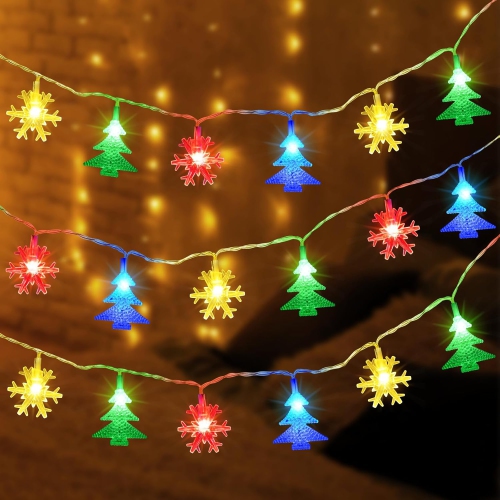 Playful Snowflake and Tree-Shaped Bulbs on Colorful String Lights Playful Snowflake and Tree-Shaped Bulbs on Colorful String Lights — Christmas Tree Lights