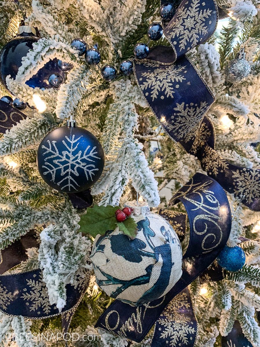 Detailed Blue and Silver Ornaments on Frosted Branches Detailed Blue and Silver Ornaments on Frosted Branches — Blue and Silver Christmas Tree