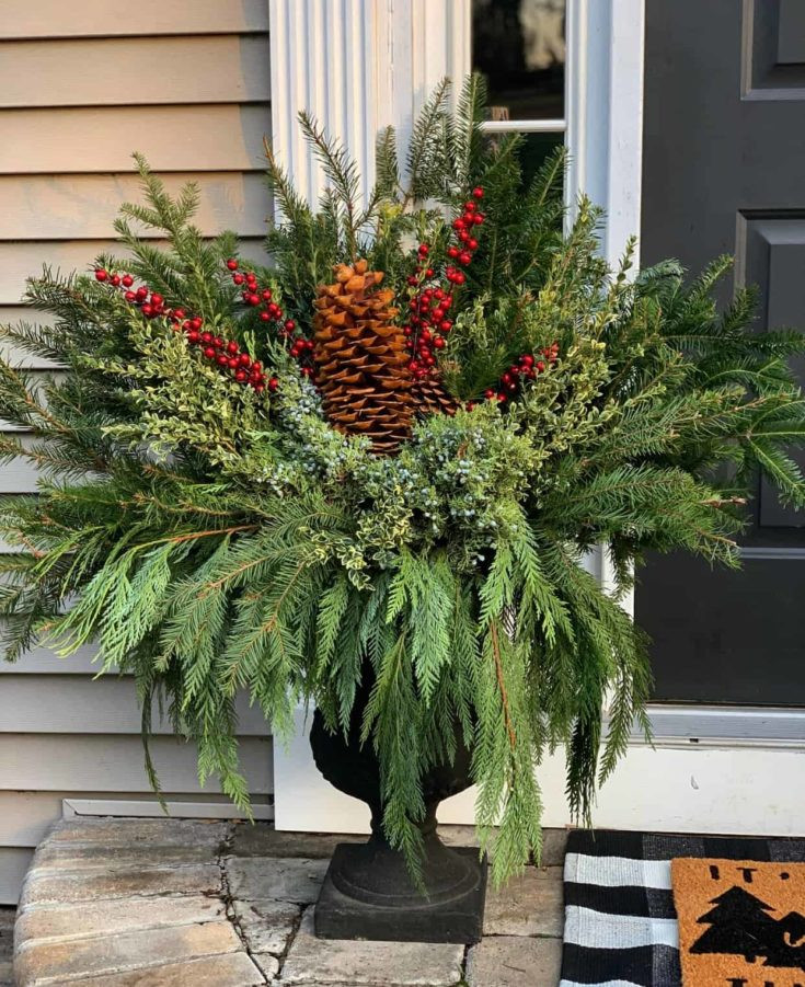 Abundant Evergreen Urn Arrangement for Farmhouse Porch Abundant Evergreen Urn Arrangement for Farmhouse Porch — Winter Front Door Decor