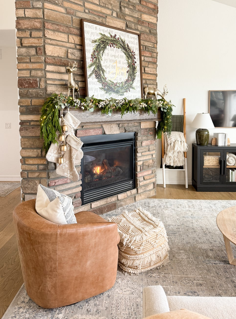 Classic Winter Mantel with Garland, Stockings, and Golden Deer — Winter Mantel Decor