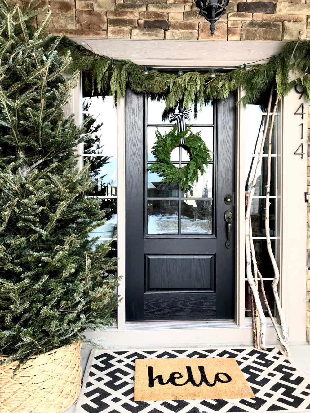 Festive Front Door with Wreath, Garland, and Birch Branches Festive Front Door with Wreath, Garland, and Birch Branches — Winter Porch Decor