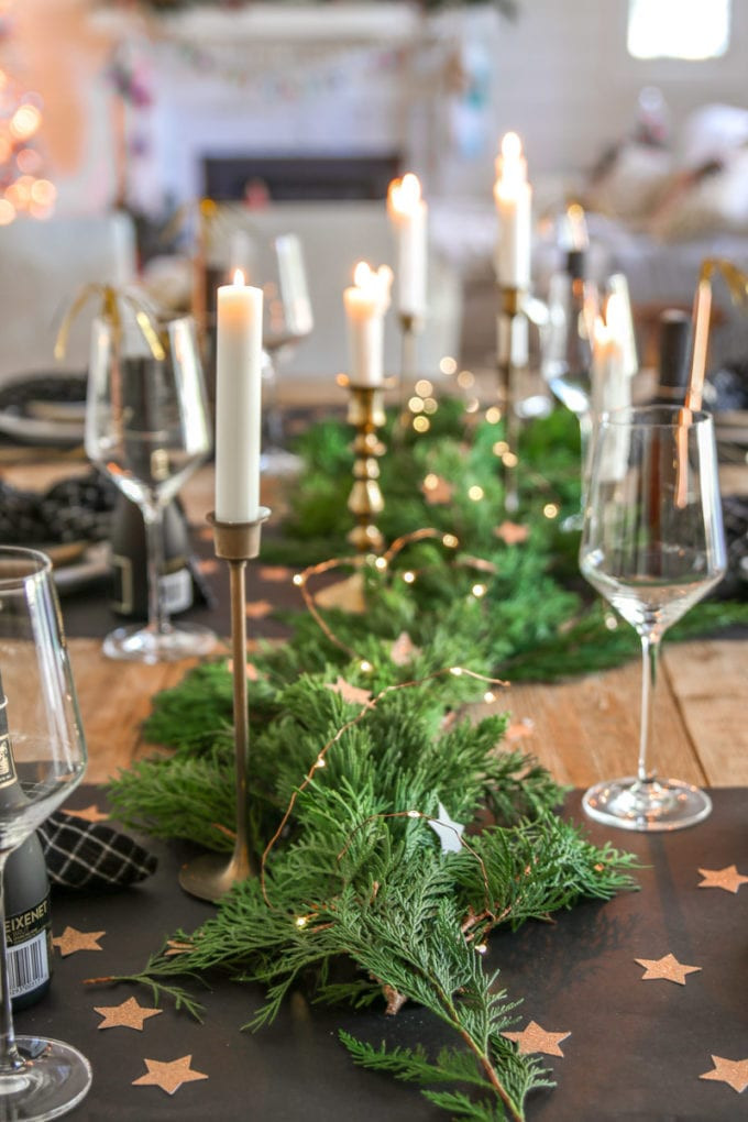 Rustic New Year's Eve Table with Pine Garland and Fairy Lights — New Years Eve Table Decor