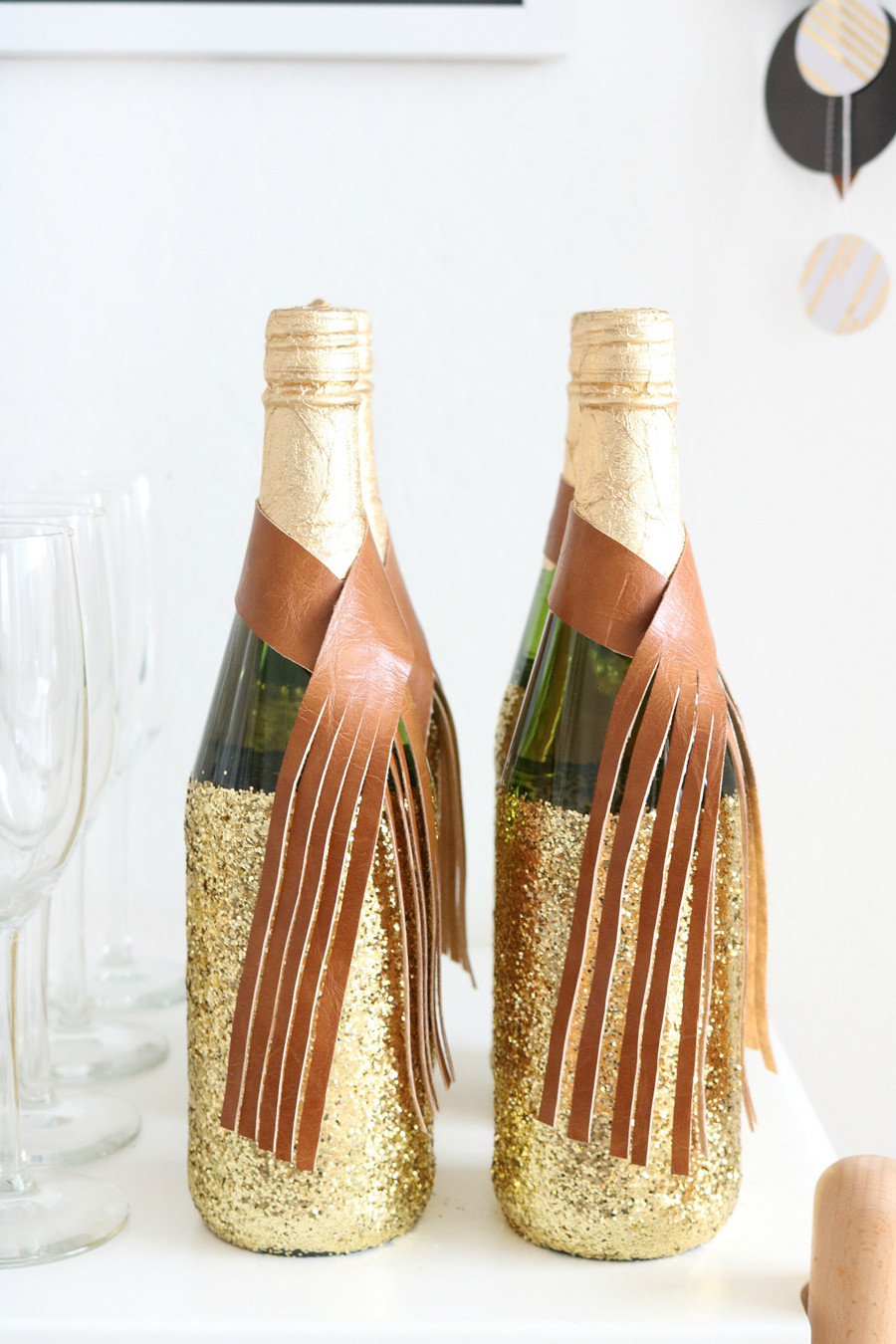 Decorate Champagne Bottles with Gold Glitter for a Festive Toast Decorate Champagne Bottles with Gold Glitter for a Festive Toast — Gold New Years Eve Decor