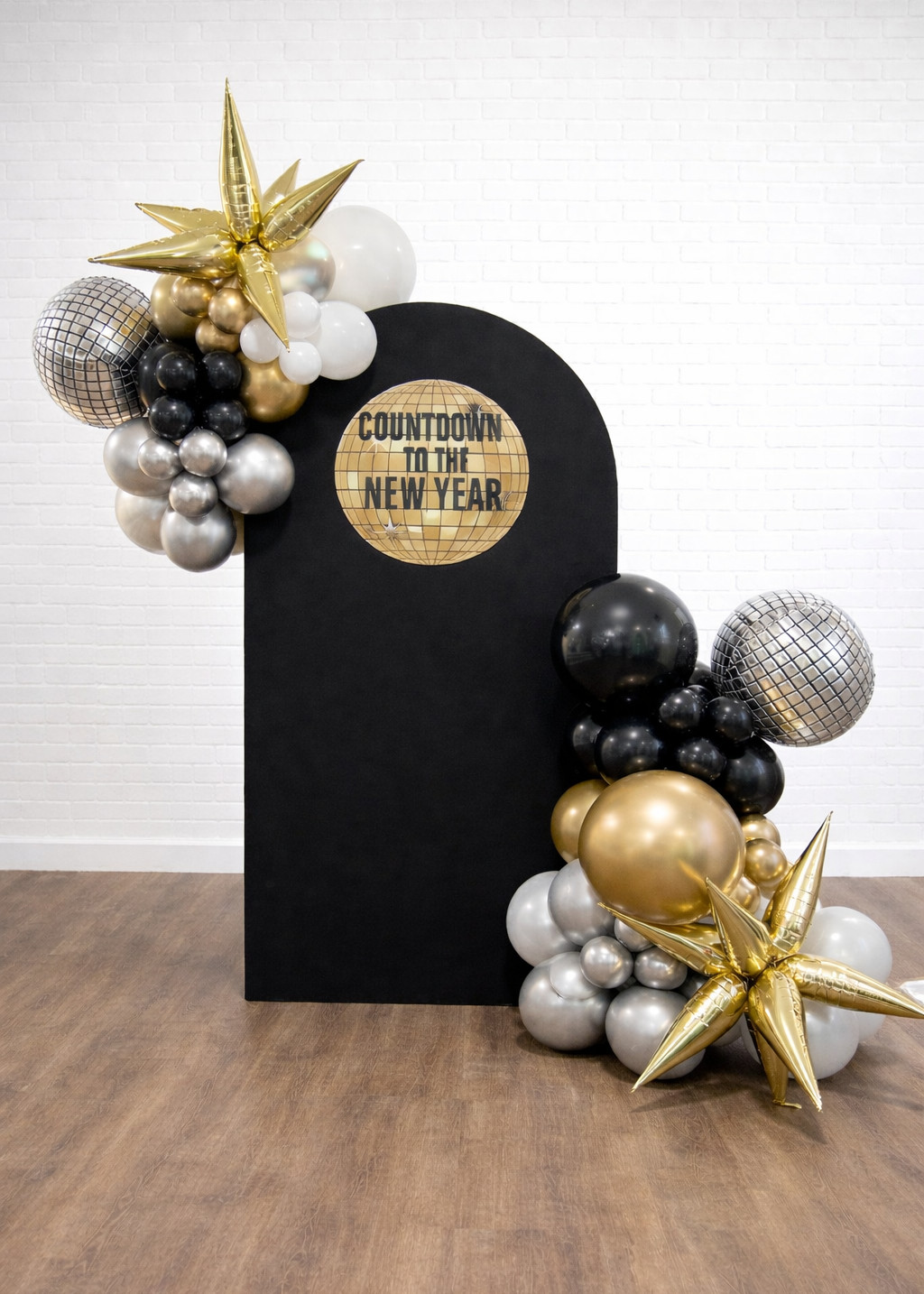 Modern Arch with Black, Gold, and Silver Balloon Garland and Disco Balls Modern Arch with Black, Gold, and Silver Balloon Garland and Disco Balls — New Years Eve Balloon Garland