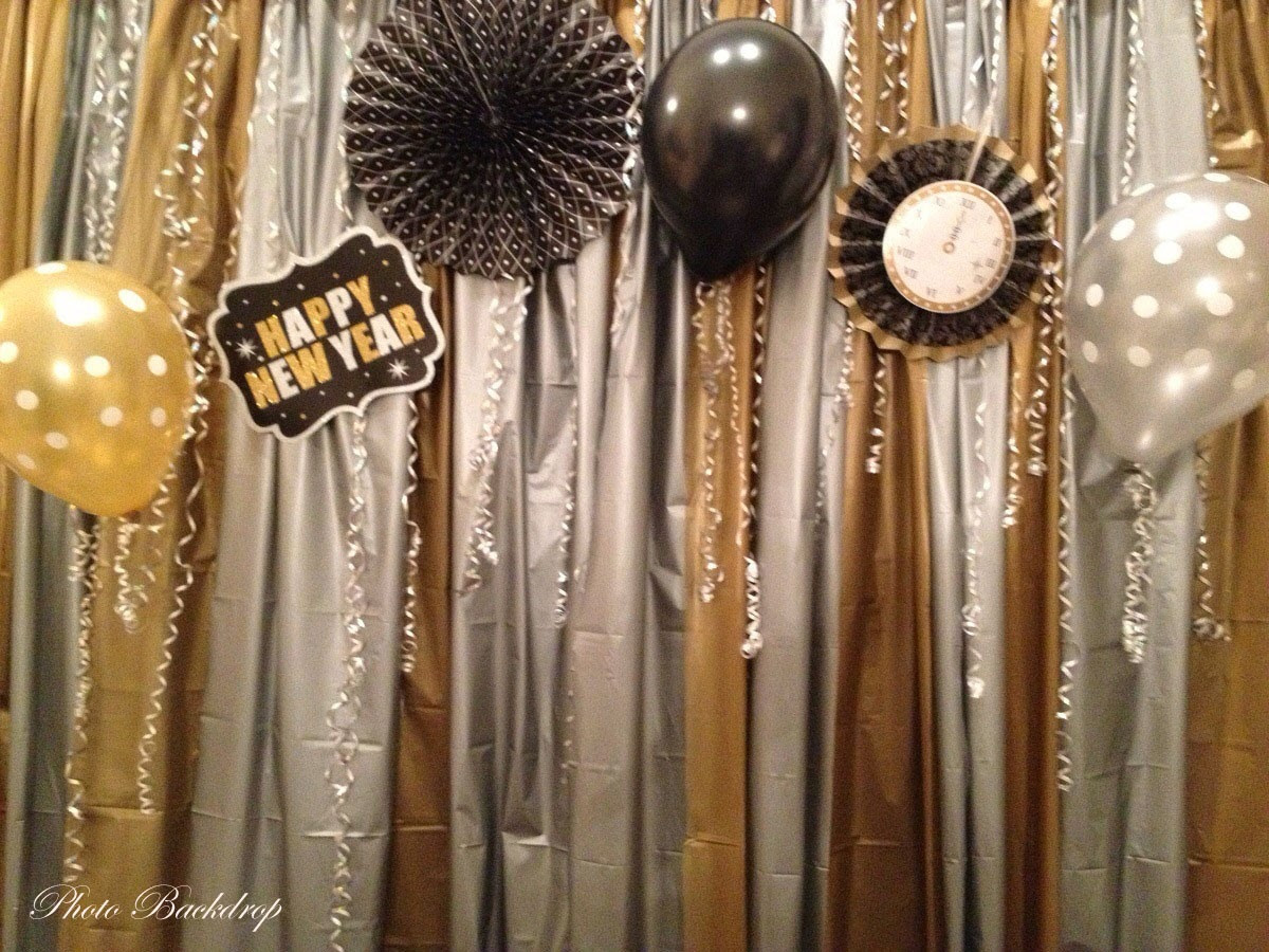 DIY Metallic Streamer Backdrop for a Festive Feel — New Years Eve Backdrop
