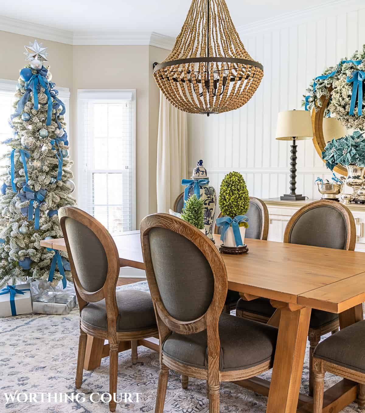Tall Flocked Dining Room Tree with Blue and Silver Decor Tall Flocked Dining Room Tree with Blue and Silver Decor — Blue and Silver Christmas Tree