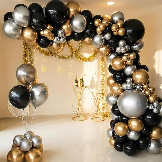 Glamorous Black, Gold, and Silver Balloon Garland Arch with Metallic Accents Glamorous Black, Gold, and Silver Balloon Garland Arch with Metallic Accents — New Years Eve Balloon Garland