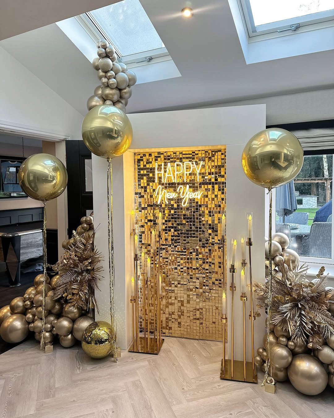 Modern Glam Gold Sequin Wall with a 'Happy New Year' Neon Sign — New Years Eve Party Decor