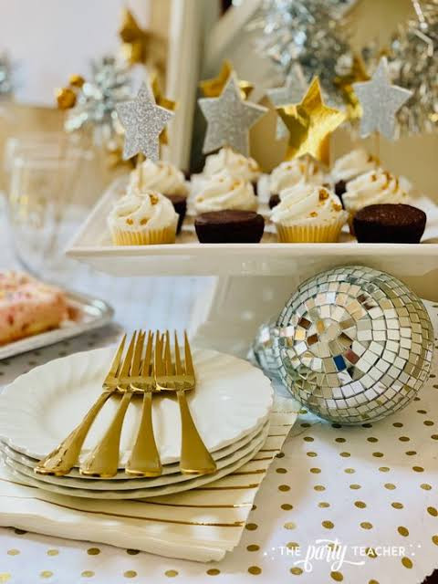 Festive Cupcakes with Gold Stars and Disco Ball Festive Cupcakes with Gold Stars and Disco Ball — New Years Eve Dessert Table