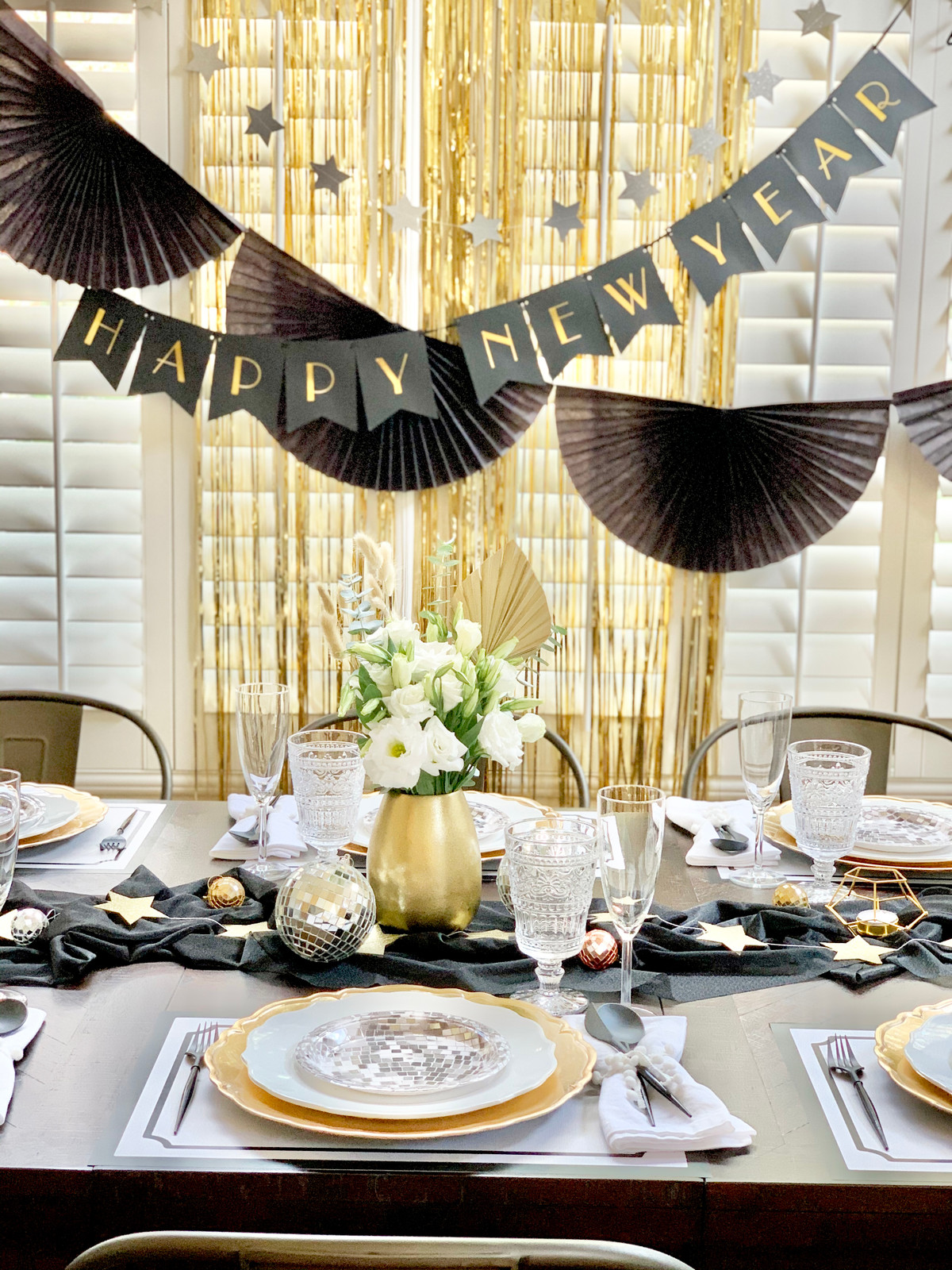 Create a Glamorous New Year's Eve Backdrop with a Gold Fringe Curtain Create a Glamorous New Year's Eve Backdrop with a Gold Fringe Curtain — Gold New Years Eve Decor