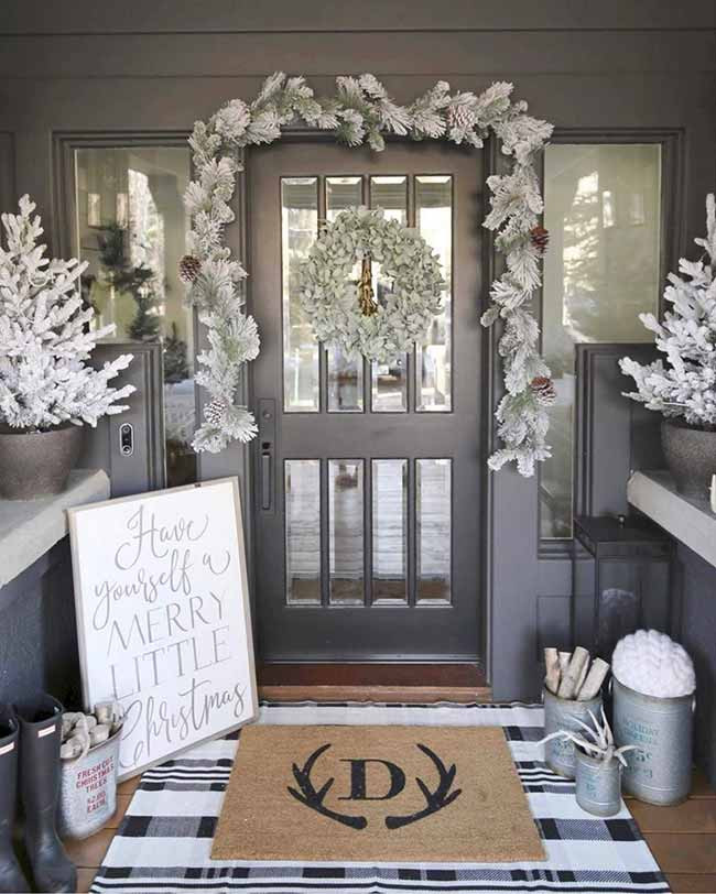 Symmetrical Flocked Garland and Mini Trees for Welcoming Porch Symmetrical Flocked Garland and Mini Trees for Welcoming Porch — Winter Front Door Decor
