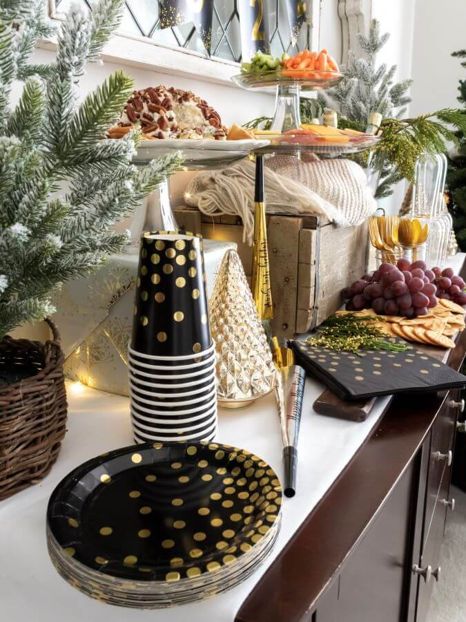 Modern Buffet Area with Black and Gold Party Supplies — New Years Eve Table Decor