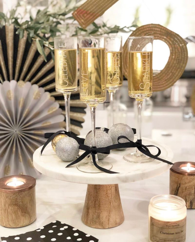 Glamorous Table Vignette with Textual Champagne Flutes — New Years Eve Table Decor