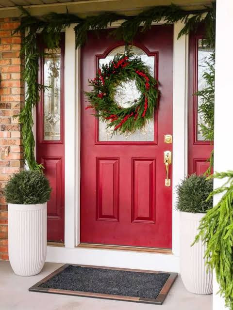 Bold Red Door with Lush Green Wreath and Planters Bold Red Door with Lush Green Wreath and Planters — Winter Front Door Decor