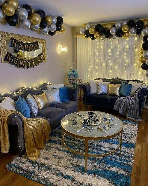Modern Living Room with a Dramatic Balloon Arch and Twinkling Lights — New Years Eve Party Decor