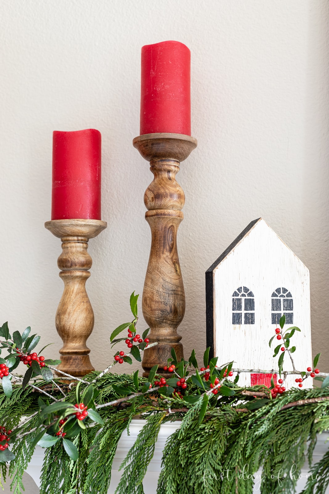 Traditional Mantelpiece with Turned Wooden Candleholders and Red Candles Traditional Mantelpiece with Turned Wooden Candleholders and Red Candles — Christmas Candle Decor