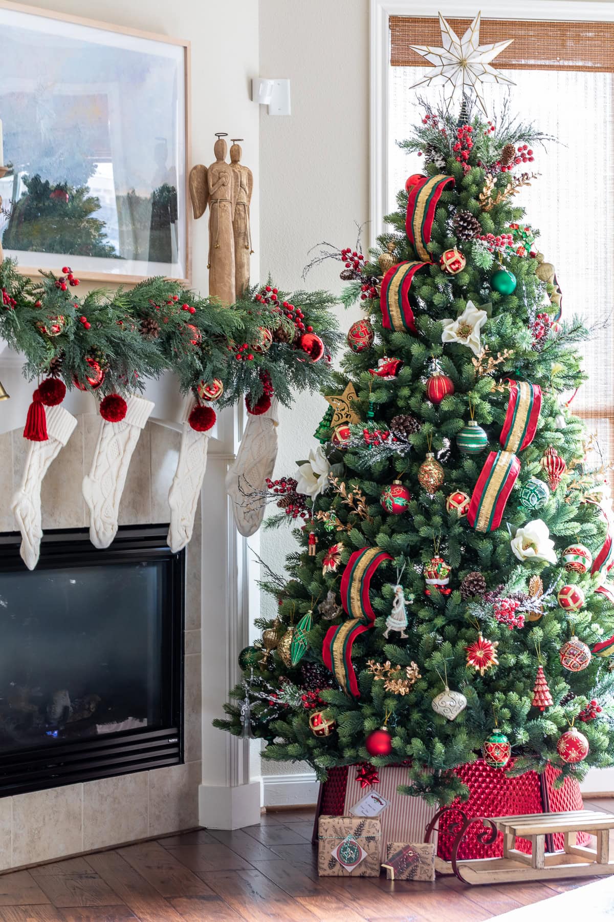Christmas Tree and Fireplace Adorned with Red and Green Decor Christmas Tree and Fireplace Adorned with Red and Green Decor — Red and Green Christmas Tree