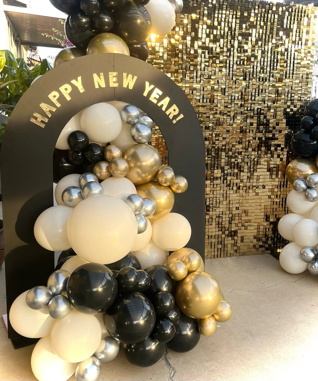 Outdoor New Year's Eve Archway with Black, White, and Gold Balloon Garland Outdoor New Year's Eve Archway with Black, White, and Gold Balloon Garland — New Years Eve Balloon Garland