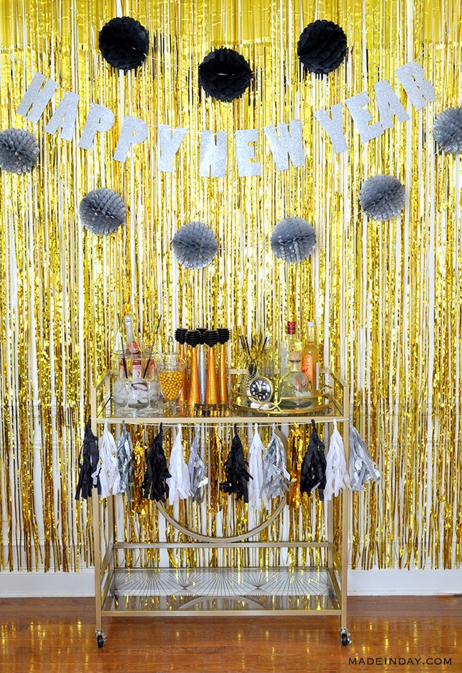 Foil Fringe Curtain Backdrop with Glitter Banner and Bar Cart — New Years Eve Backdrop
