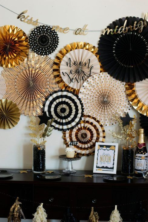 Festive Paper Fan Backdrop with Celebratory Table Decor — New Years Eve Backdrop